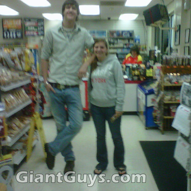 Giant boy in convenience store