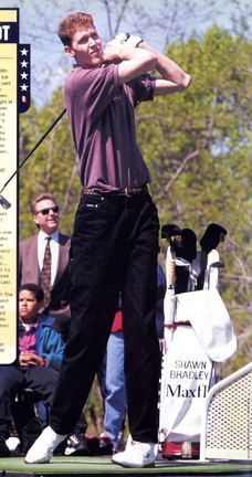 Shawn Bradley golfing