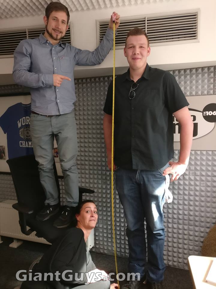 7ft2 tall guy Lukas getting measured