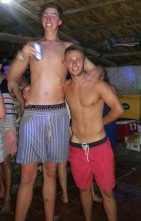 Shirtless Tall Guy at party